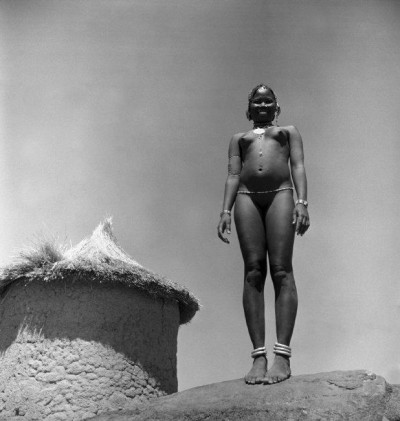 A young unmarried girl of the Messakin Tiwal tribe. Kordofan, Sudan. 1949. © George Rodger / Magnum Photos