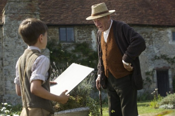 Mr. Holmes. Competition, GBR 2014, DIRECTOR: Bill Condon. Milo Parker, Ian McKellen, Giles Keyte © Slight Trick Production